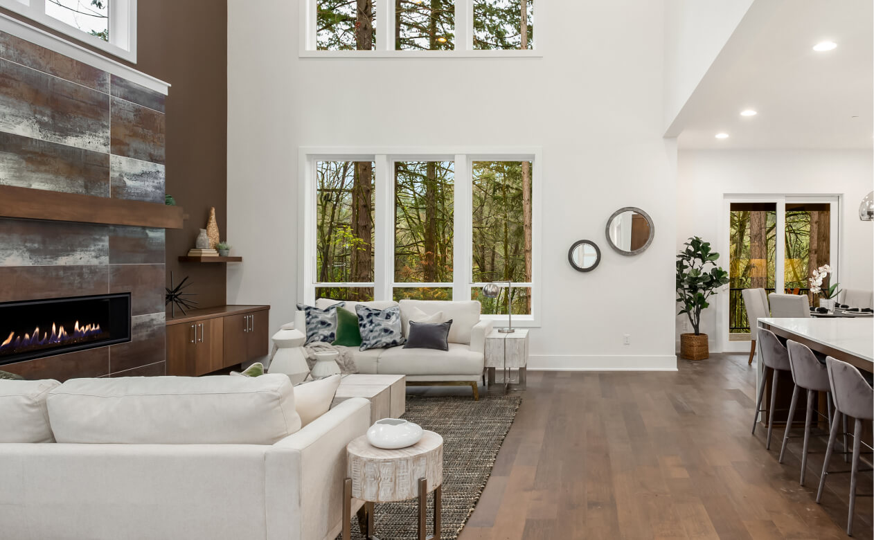 luxury vinyl plank flooring in an open living room and dining area